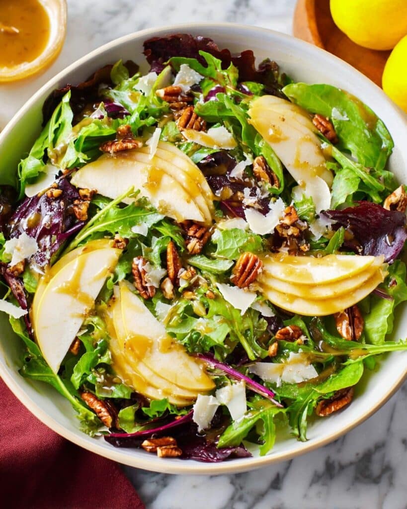Pear Salad with Balsamic Vinaigrette, Cranberries, and Candied Pecans Recipe